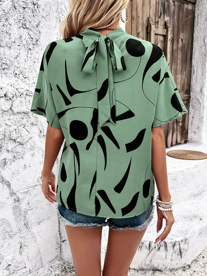 Tied Printed Mock Neck Half Sleeve Blouse